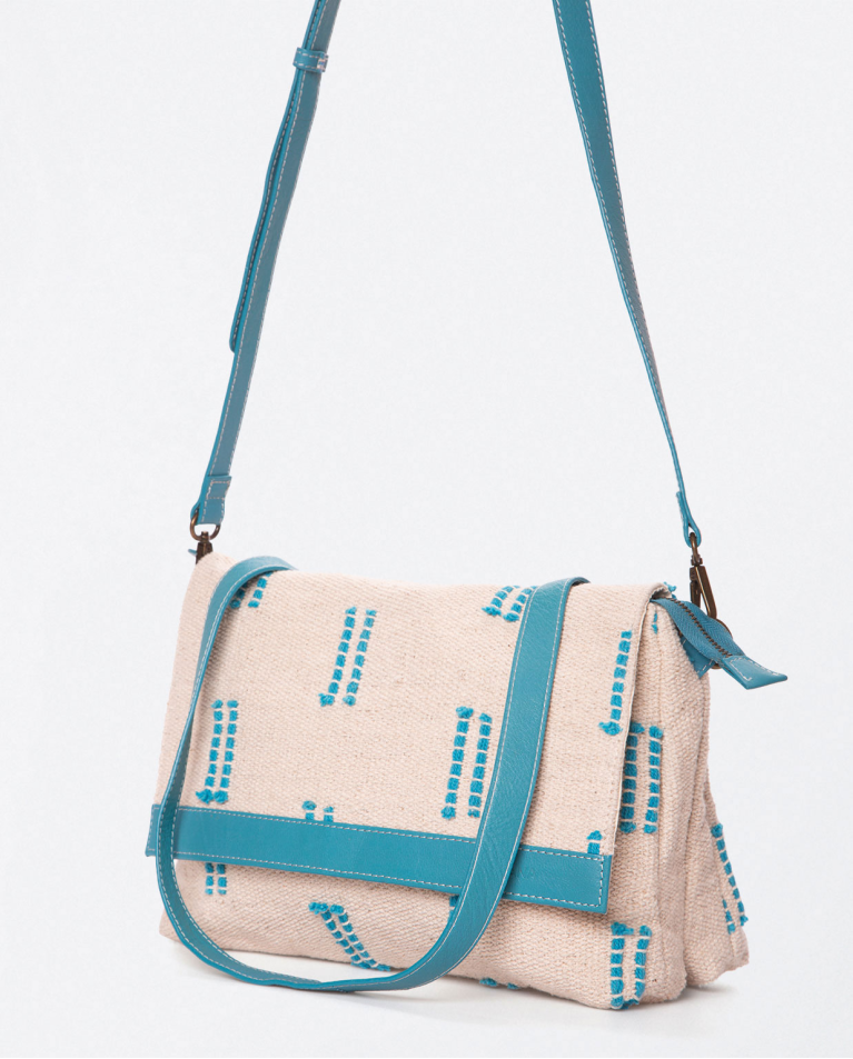 Shoulder bag with flap and short handle. Turquoise