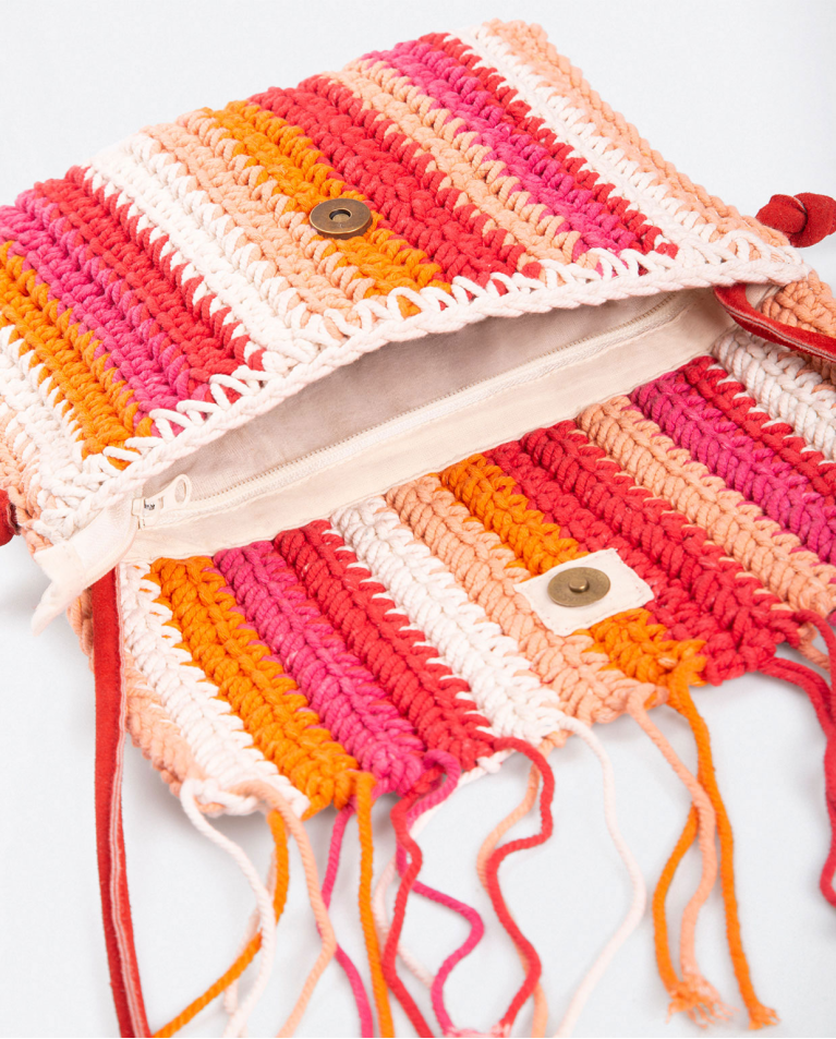 Crochet shoulder bag with fringed flap. Hand knitt Fuchsia