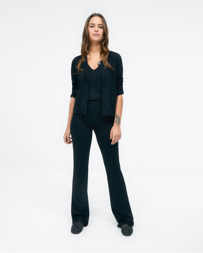 Short jacket without collar. Button fastening. Pla Black
