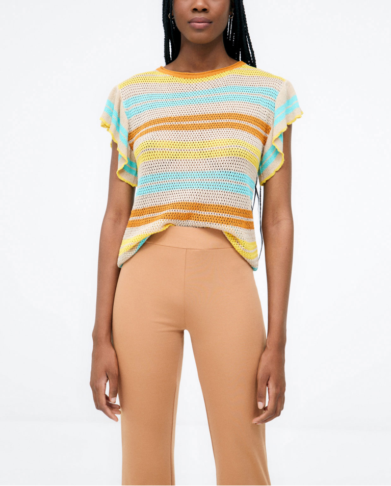 Pantalón largo campana. Elástico. Liso Beige