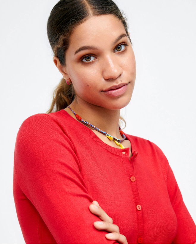 Short knitted cardigan with...