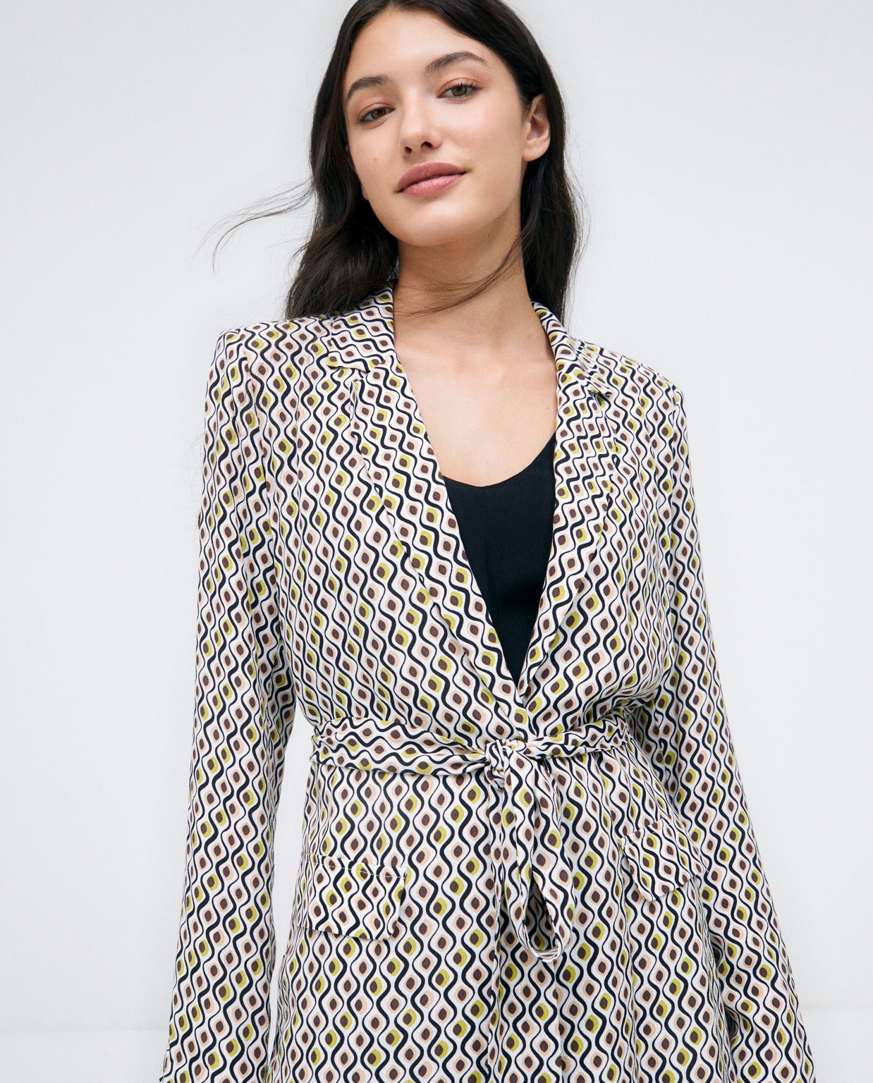 Jacket with flap pockets and belt.ed  Green