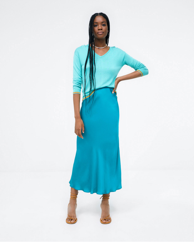 Knitted jumper. V-neck. Plain Turquoise