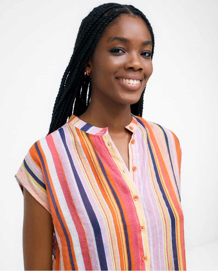 Sleeveless shirt with mao collar. Stripes. Orange