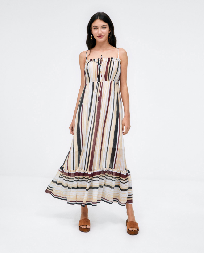 Long dress with straps and ruffle. Stripes Beige