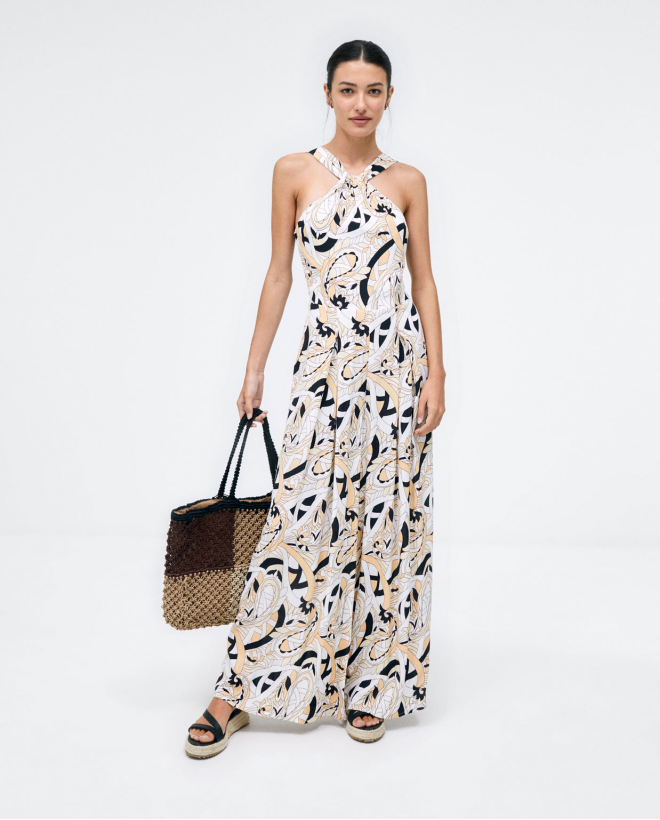 Wide leg jumpsuit. Halter neck. Beige