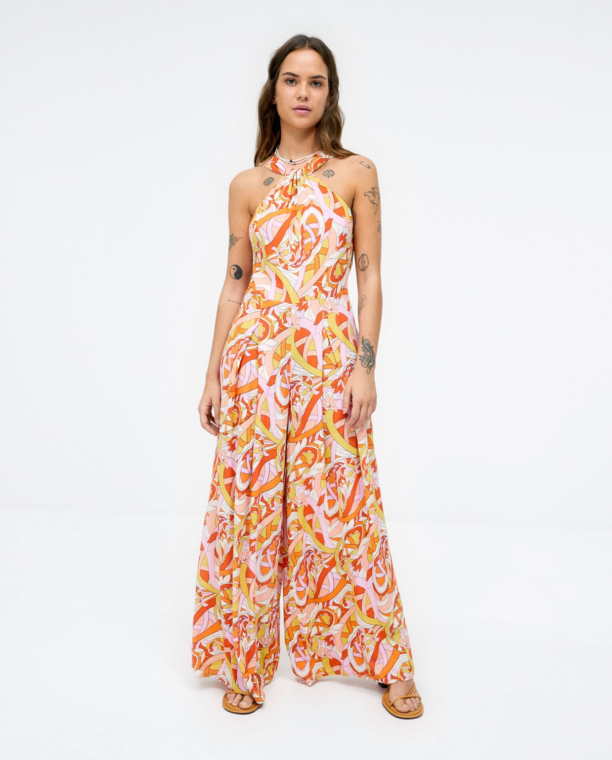 Wide leg jumpsuit. Halter neck. Orange