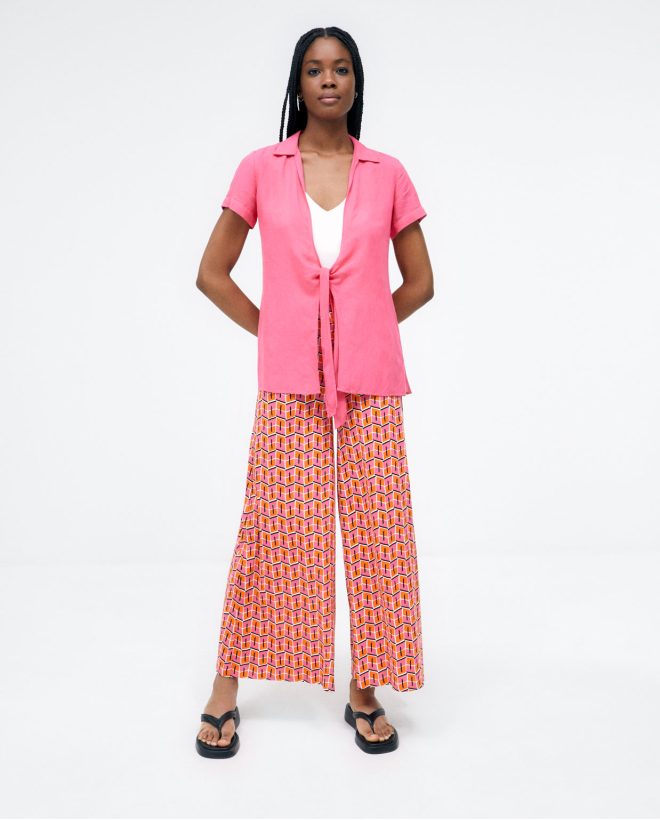 Knotted short sleeve blouse. Plain Fuchsia