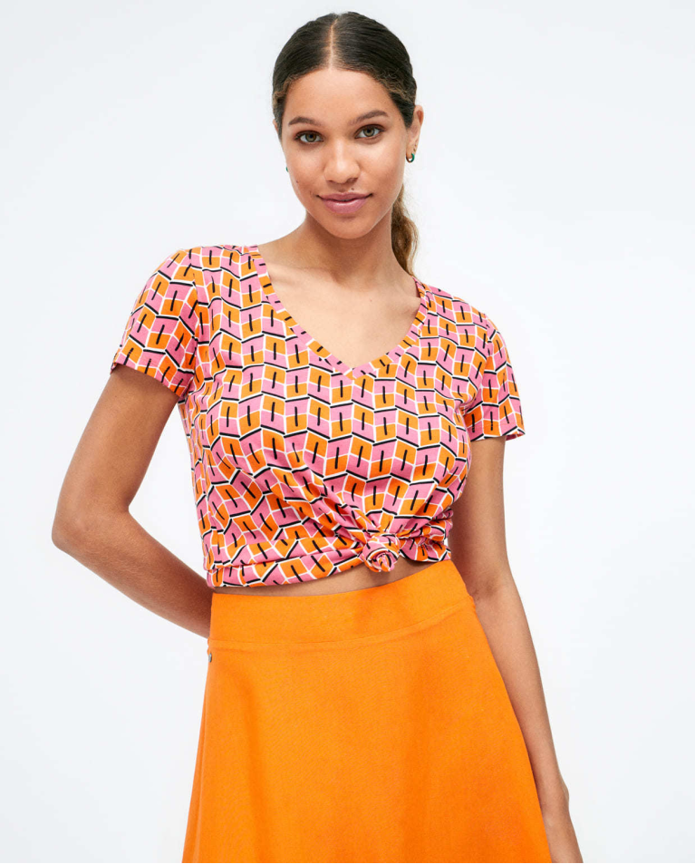 Falda midi de punto acampanada. Lisa Naranja