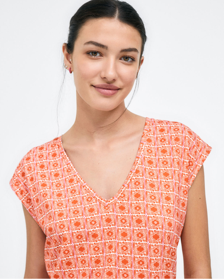 Camiseta manga japonesa. Elástica. Estampado Naranja