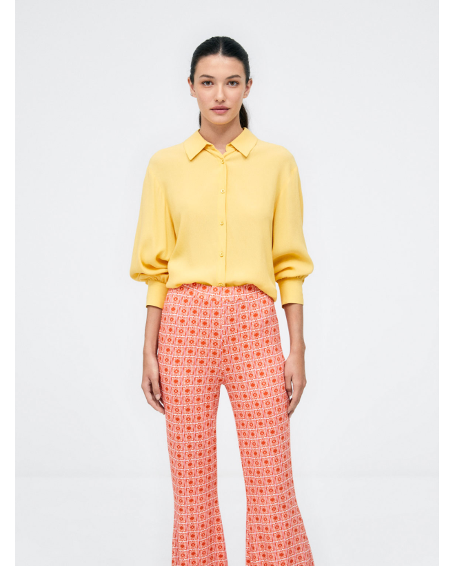 Long bell-bottom trousers. Elastic. e print Orange