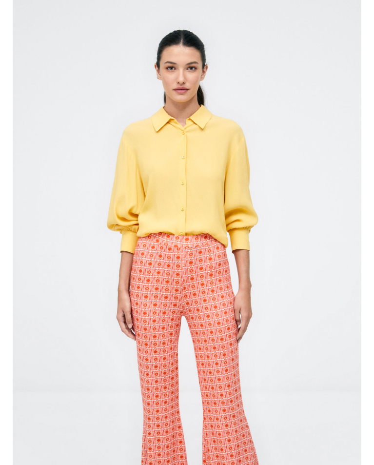 Long bell-bottom trousers. Elastic. e print Orange