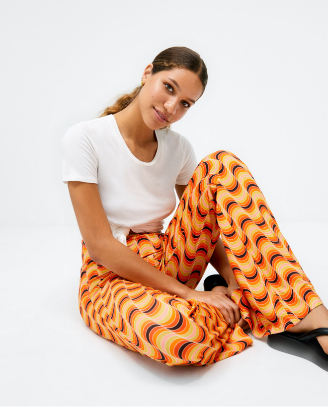 Long bell-bottom trousers....