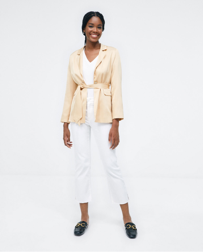 Blazer with flap pockets and belt. Plain Beige