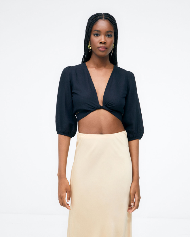 Fla knitted midi skirt. Smooth Beige