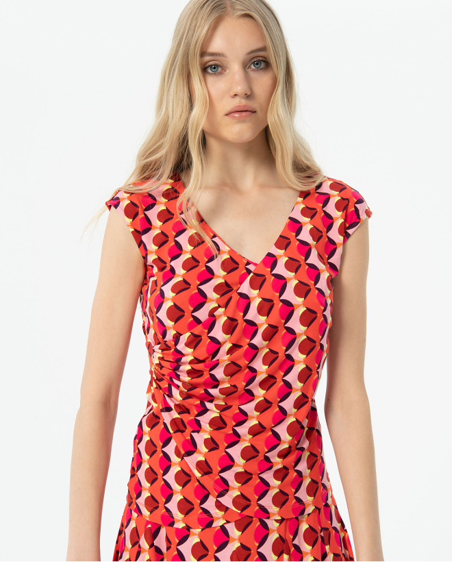 Top ajustado y cruzado estampada Fucsia