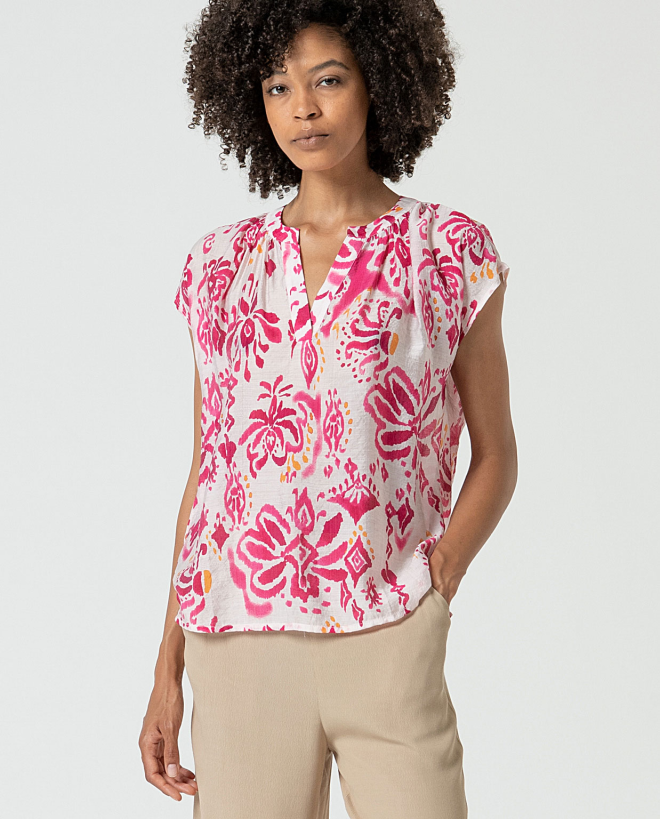 MU:Blusa com abertura de...