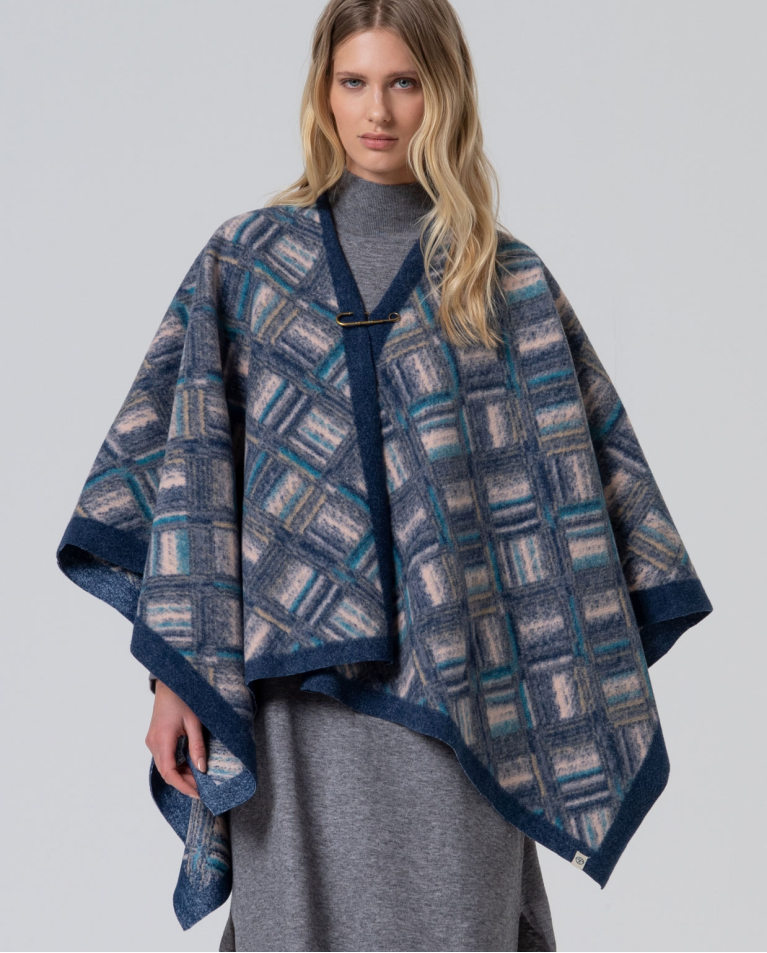 Jacquard poncho with safety pin Blue