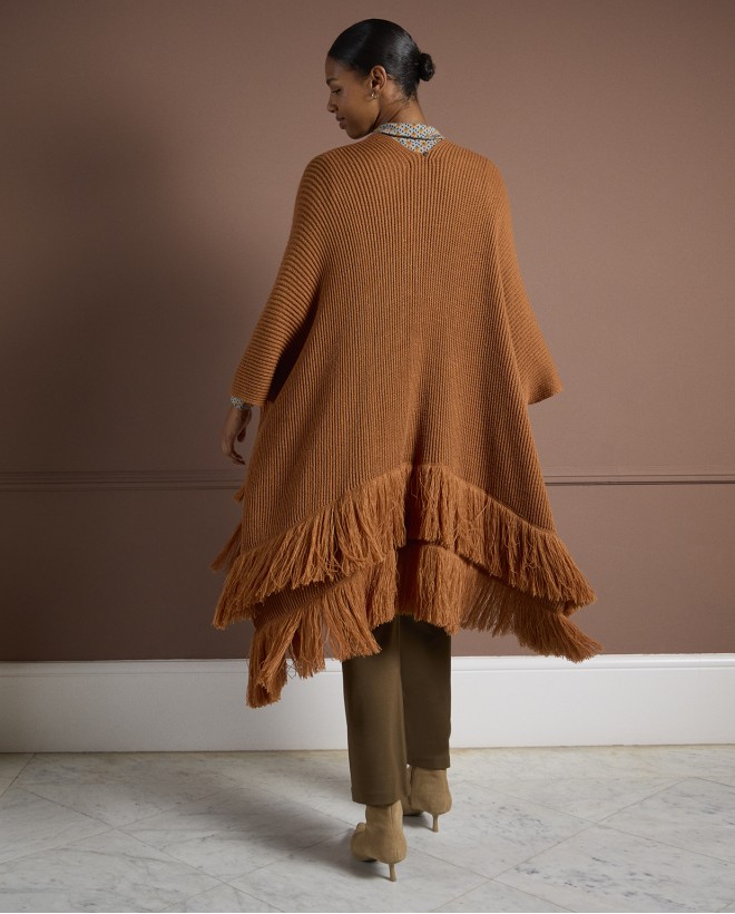 Tricot poncho with bangs Light came