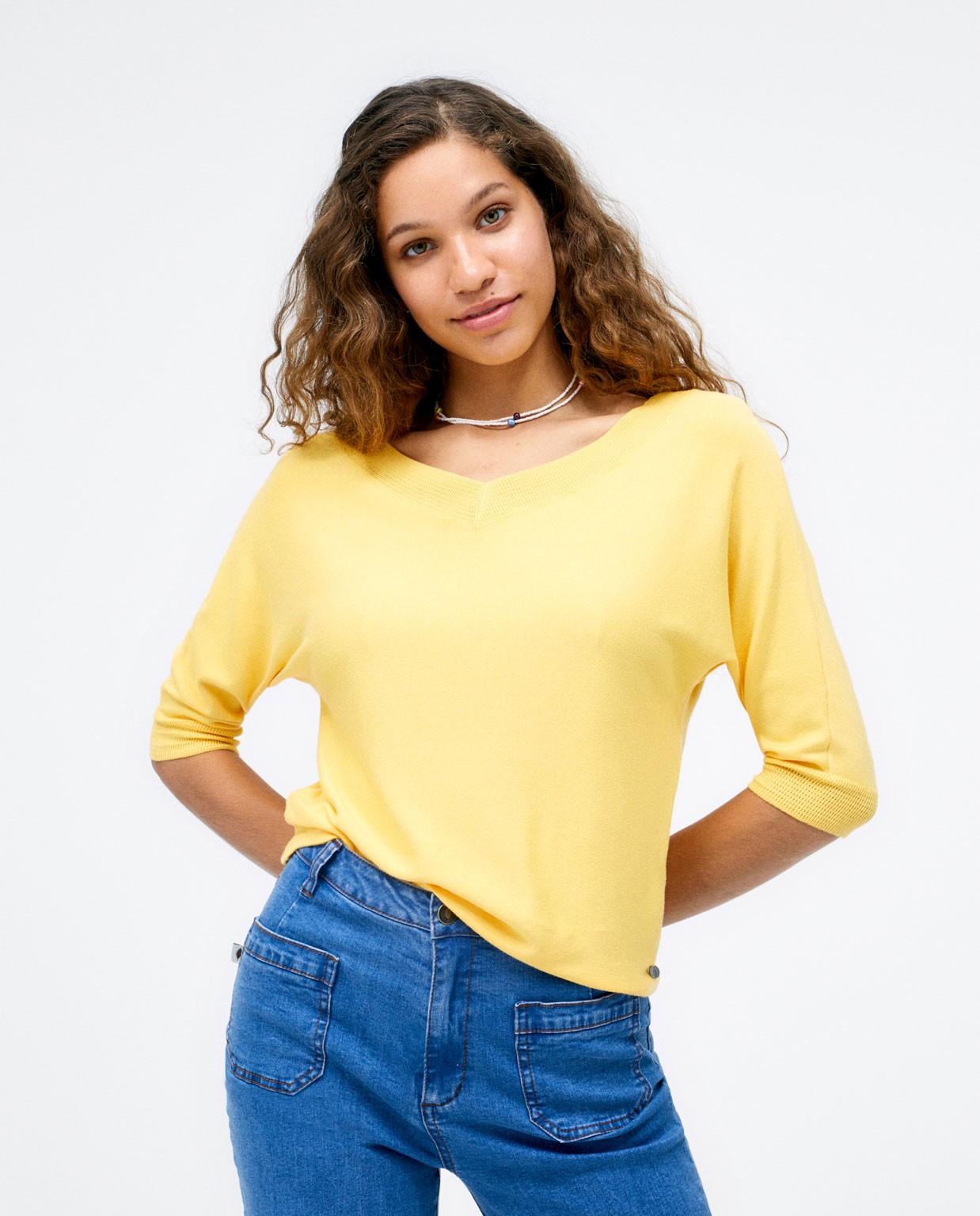 V-neck knitted jumper. Plain  Yellow