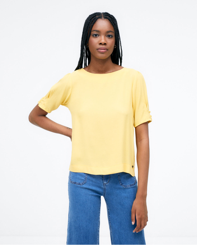 French sleeve blouse with buttoned back. Yellow
